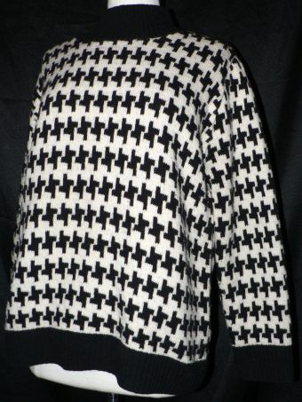 description this sweater has a modern take on the classic black and 