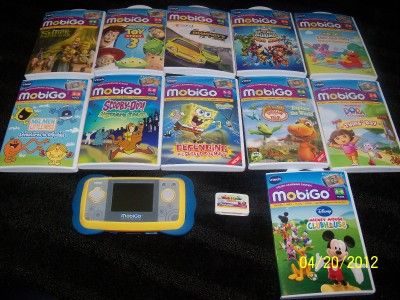   Lot EUC Blue system and 12 games Spongebob, Elmo, Mickey +  