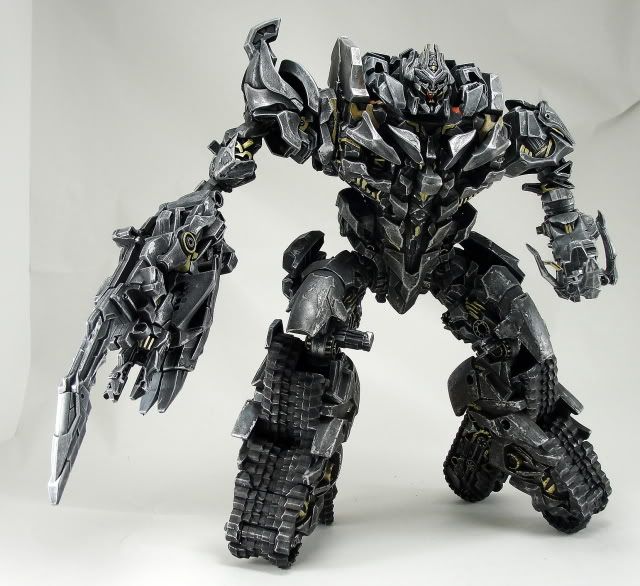  pictures show Megatron in many different poses, his murder arm 